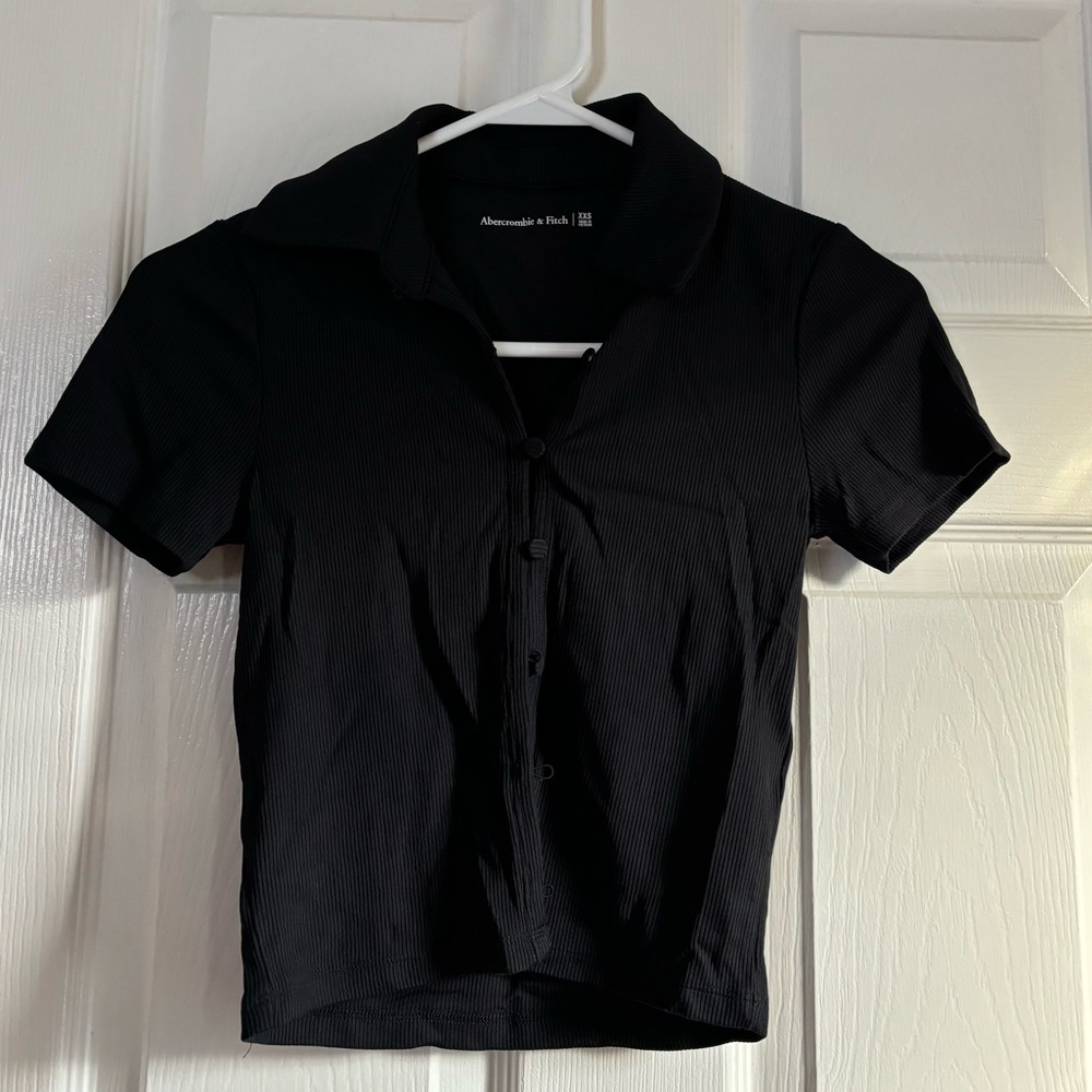 Black buttoned top